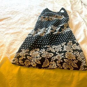 Black dress with white flowers in a diagonal , I mixed with polka dots